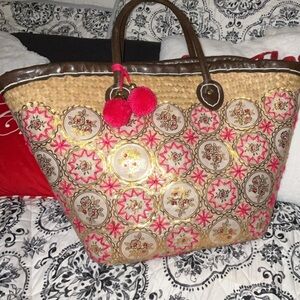 limited edition embroidered and weaved satchel bag.
